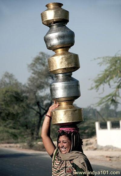 Women Balancing The Stuff