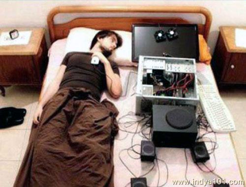 Funny Boy Sleeping in Bed with Computer GF