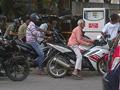 old man riding yamaha bike