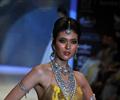 Kangna Ranaut walks the ramp for Amprapali of IIJW 2011