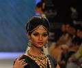 Kangna Ranaut walks the ramp for Amprapali of IIJW 2011