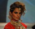 Kangna Ranaut walks the ramp for Amprapali of IIJW 2011