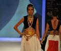 Kangna Ranaut walks the ramp for Amprapali of IIJW 2011