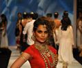 Kangna Ranaut walks the ramp for Amprapali of IIJW 2011