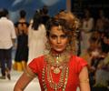 Kangna Ranaut walks the ramp for Amprapali of IIJW 2011